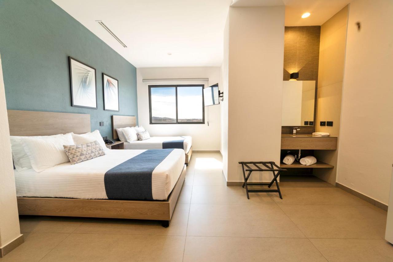 Th Hotel & Vivienda เตปาติตลัน เด โมเรลอส ภายนอก รูปภาพ