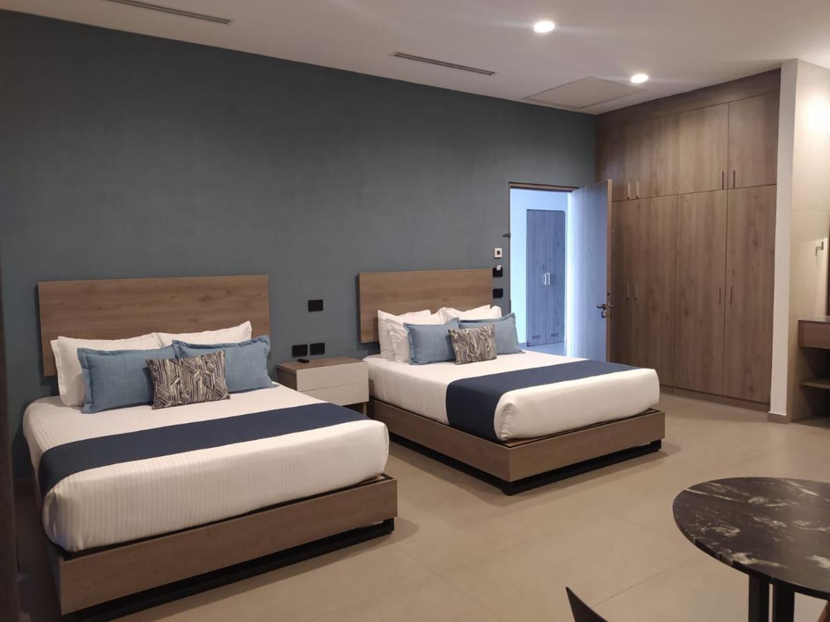 Th Hotel & Vivienda เตปาติตลัน เด โมเรลอส ภายนอก รูปภาพ