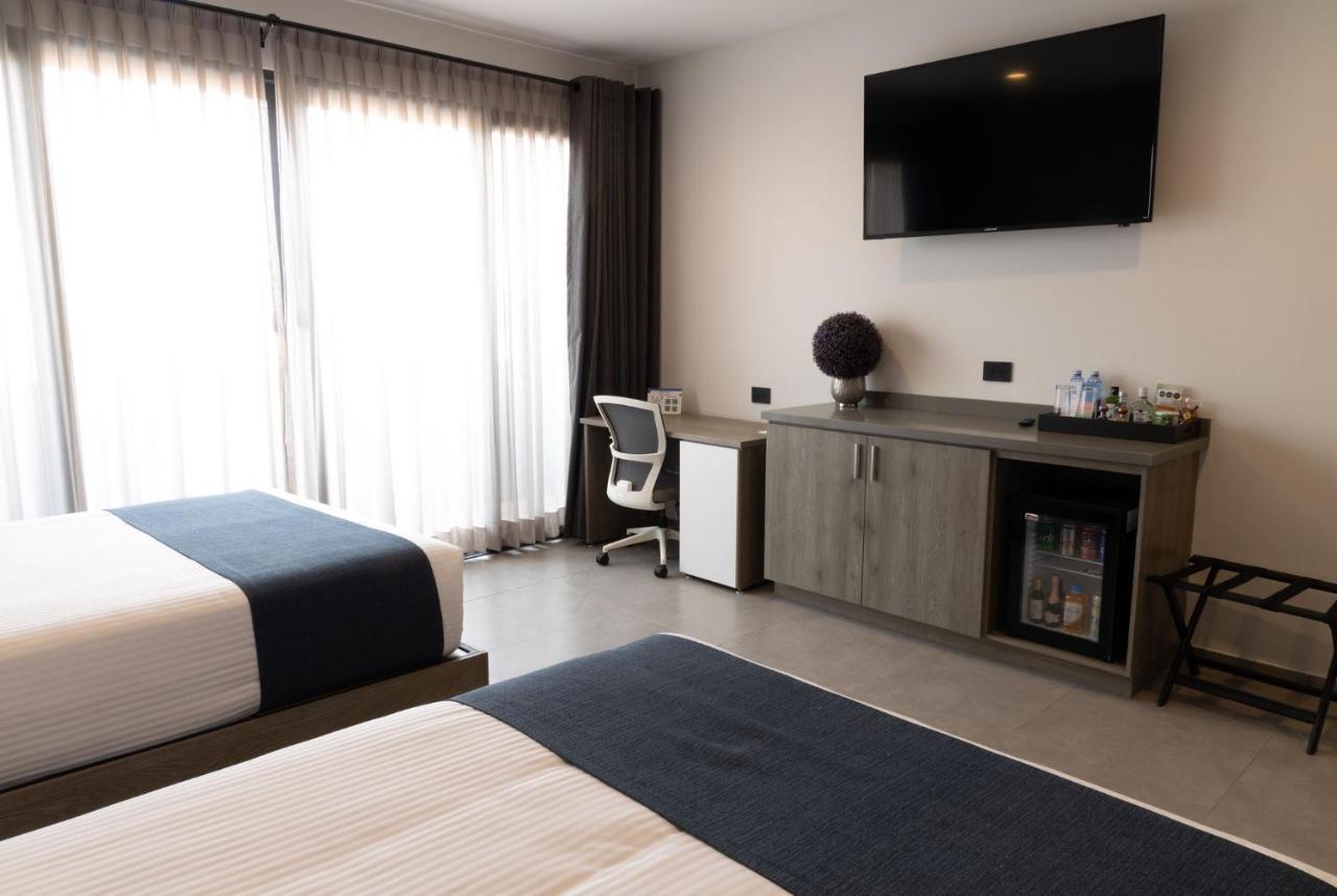 Th Hotel & Vivienda เตปาติตลัน เด โมเรลอส ภายนอก รูปภาพ